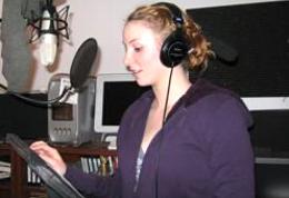 Sarah Block recording an animated script in the Allport Productions VoiceOver Booth